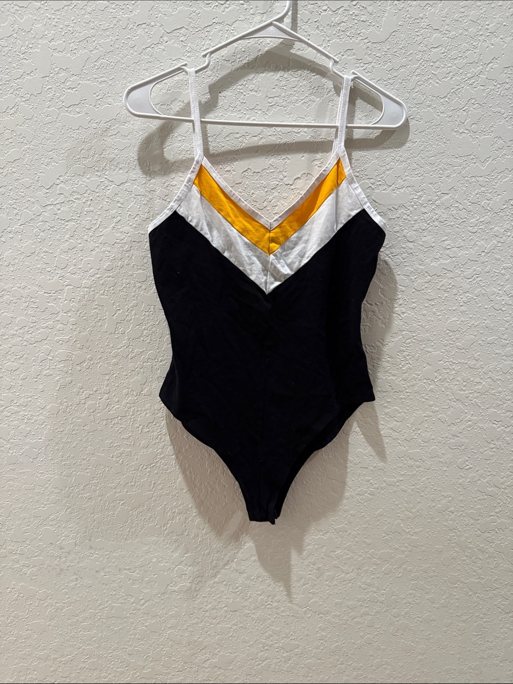 Black Bodysuit with White and Gold Chevron Detail